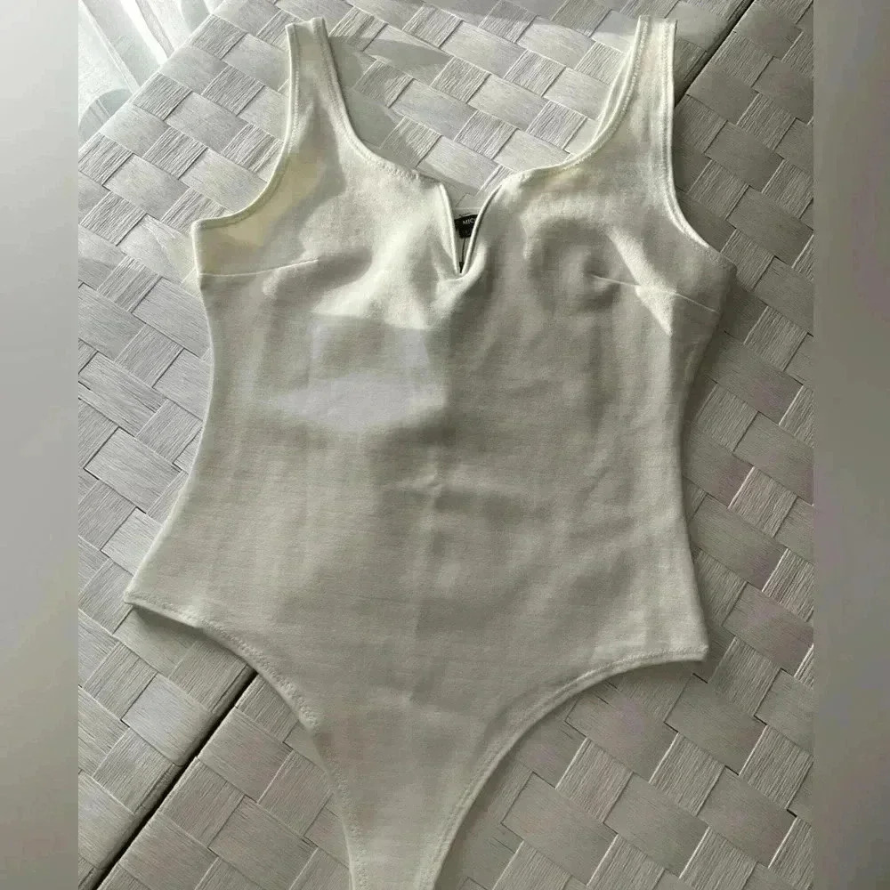 White, Body Suit, New With Tags, Size Large, Fits Tight at the Waist, Very Nice